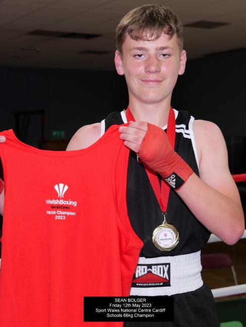 Sean Bolger proudly displays his Welsh vest